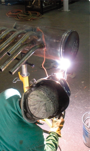 Picture of Fabrication of header Unit #3 at the APS West Phoenix Power Plant.