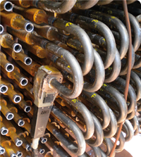 Picture of Orbital welding return bends at the APS West Phoenix Power Plant.