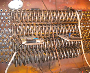 Picture of Orbital welding return bends at the APS West Phoenix Power Plant.